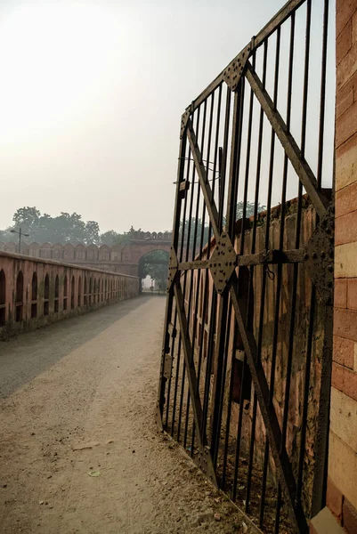 Bahadur Shah Gate at head of Arched bridge linking Salimgarh Fort and Red Fort. New Delhi, India