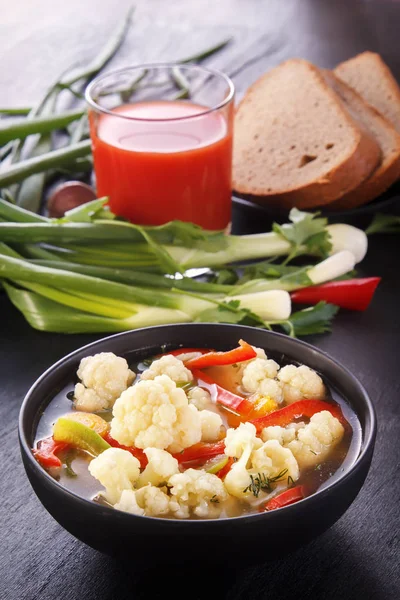 Vegetable Soup Cauliflower Carrots Tomato Pepper Black Plate Black Background — Stock Photo, Image