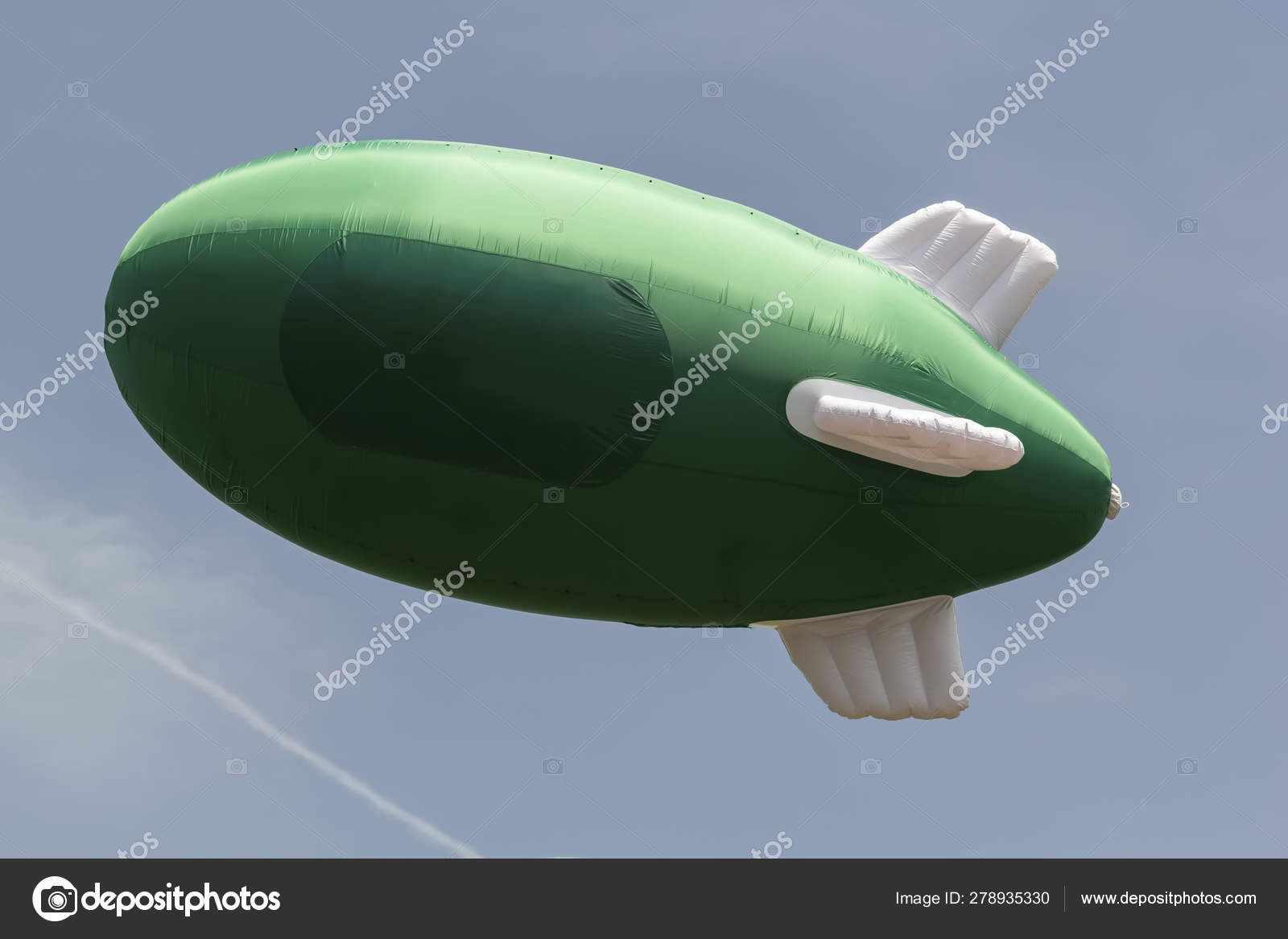 Download Green Inflatable Airship With A Place For The Logo On The Background Of Blue Sky With Clouds Mockup Stock Photo Image By C Alexey Arz 278935330
