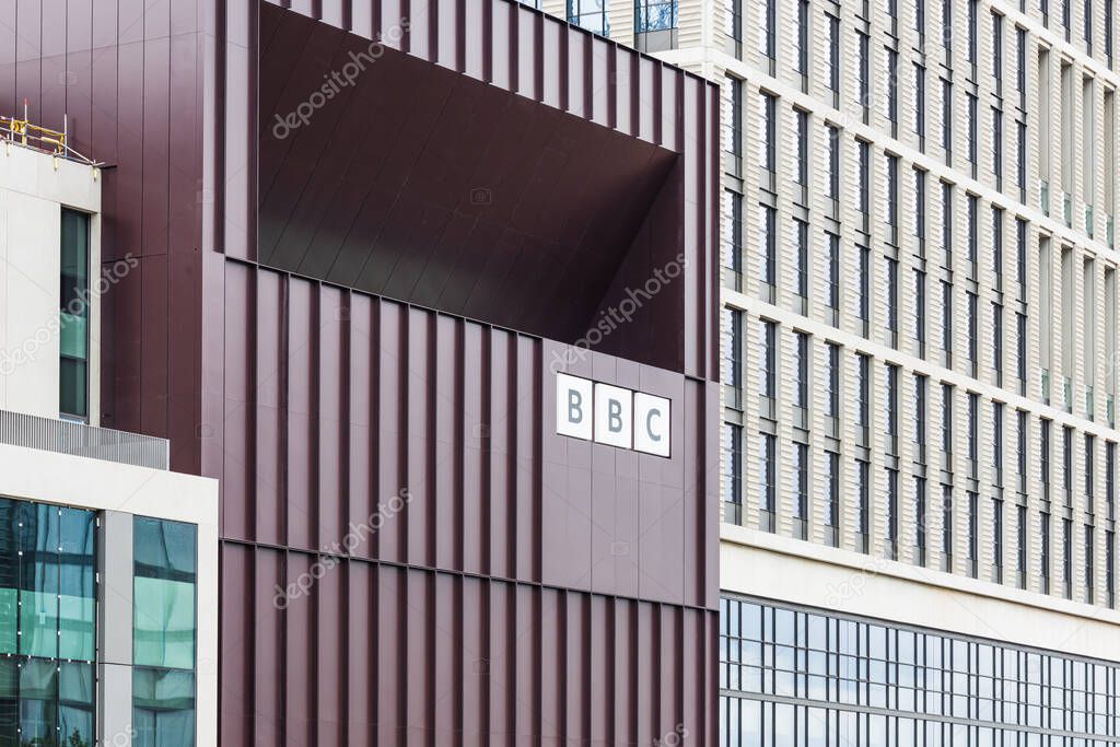 Close up of a BBC building with modern cladding and a prominent logo. London, UK, 14 July 2024