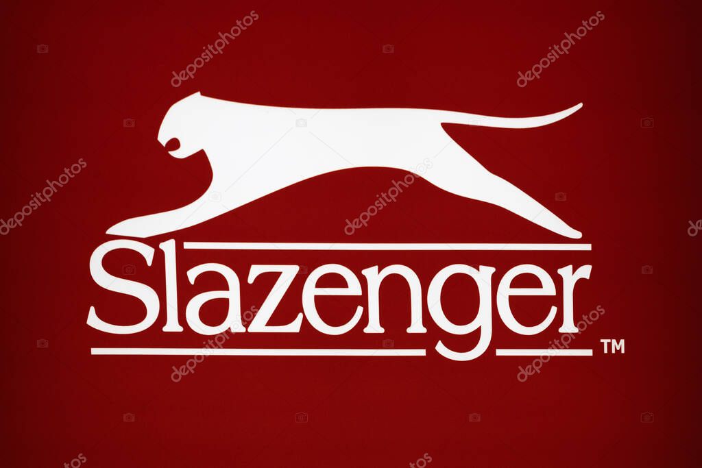 White Slazenger panther logo on rich red background. London, UK, 28 July 2024