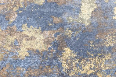 Lekeli mavi ve lacivert renkte duvar dokusu.