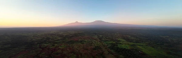 Aerial Panoramic View Mount Kilimanjaro Volcano Summit Covered Snow Lit — Stockfoto