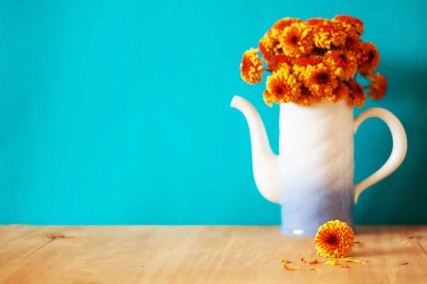 Flowers Teapot Wooden Table Front Turquoise Background Home Decoration Concept — Stock Photo, Image