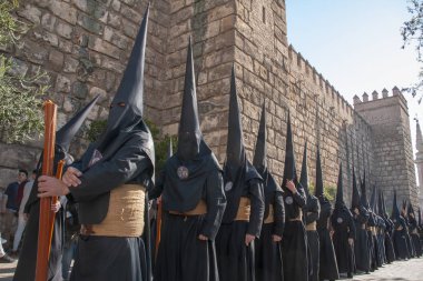 Holy Week in Seville, the penitents clipart