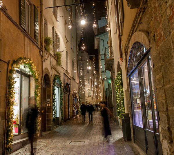 Shops decorated for Christmas festivities in old bergamo