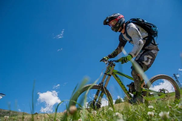 Livigno italy 27th July 2015: descent along the ski slope by bike