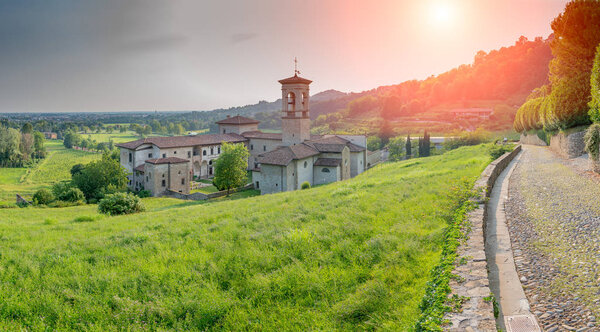 monastery of astino at sunset