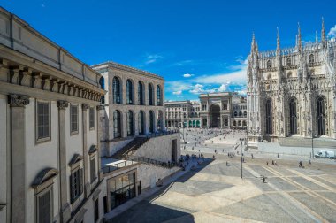 Milan Duomo square with a view of the museum of the twentieth clipart