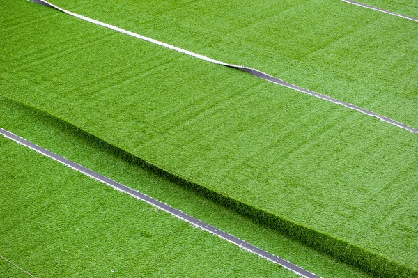 Campo in erba sintetica — Foto Stock