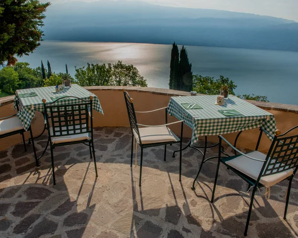 small table with chair overlooking Lake