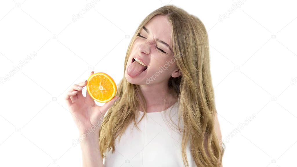 Girl with an orange in hand,a beautiful little girl in a white dress,on a white background,portrait,close-up