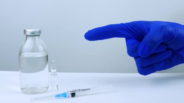 Ett Finger Medicinsk Handske Kräver Vaccin Kroppsspråk Vaccin Burk Och — Stockvideo