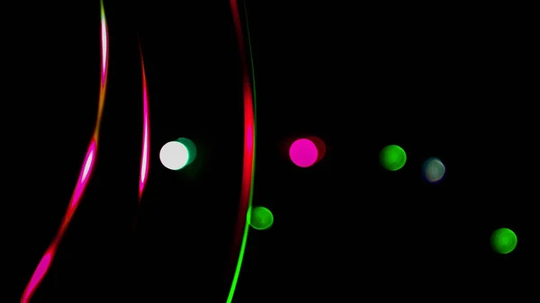 Bokeh colored circles and lines on a black background, abstract background, wallpaper, computer graphics
