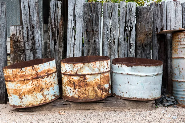 Recycle and reuse old oil barrel iron tank.