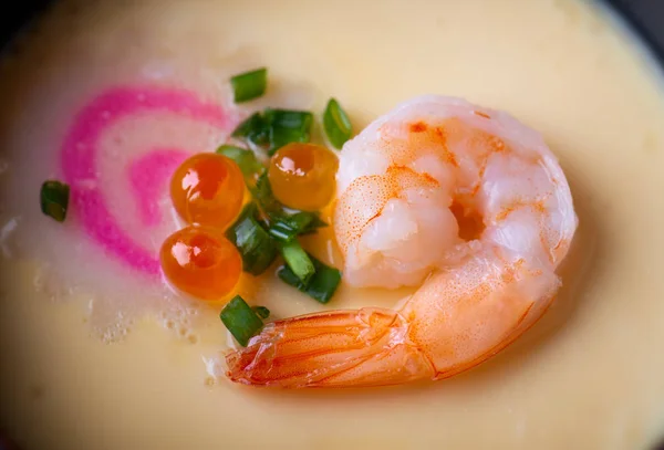 Japanese steamed eggs with shrimp and other topping.