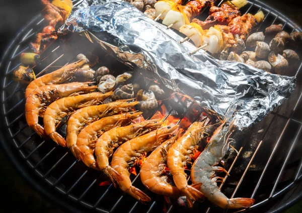 Grilled flame fire seafood and barbecue foods.