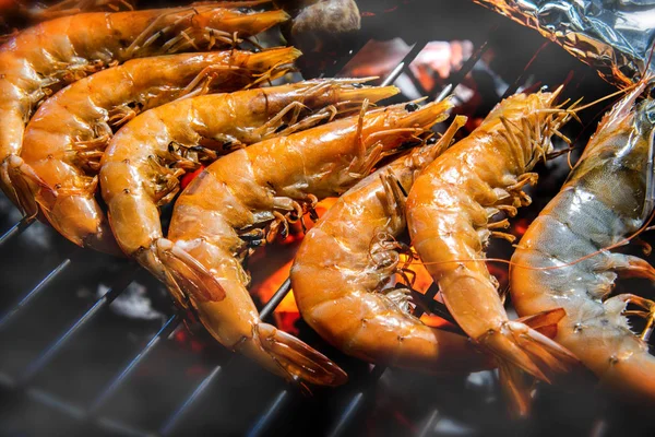 Grilled flame fire seafood and barbecue foods.