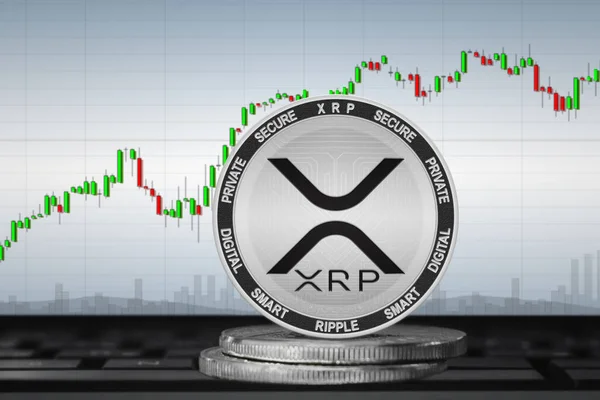 Grafiğin arka planında XRP para birimi; XRP para birimi