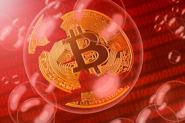 Bitcoin crash; cracked coin bitcoin in a bubble on the binary code background. Close-up