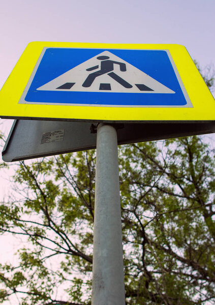 2018.05.09, Moscow, Russia. road sign of pedestrian crossing close up.