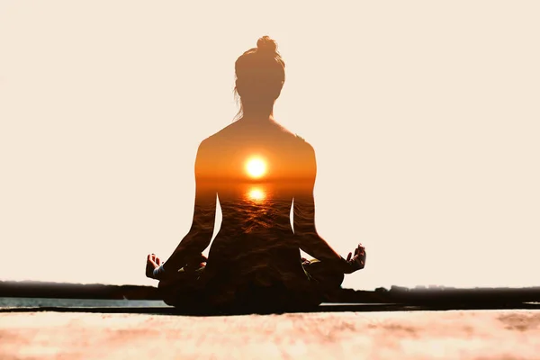 Yoga day concept. Multiple exposure image. Woman practicing yoga at sunset. — Stock Photo, Image