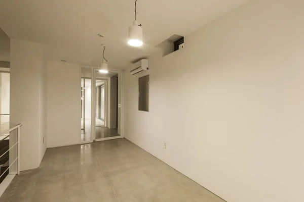 white studio with ceiling lighting in a white space