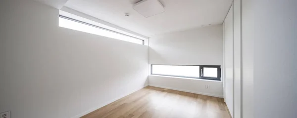 white room with window at the night.