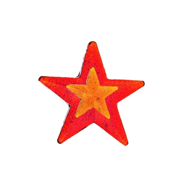 Piruleta roja y naranja en forma de estrella aislada. Piruleta casera . — Foto de Stock