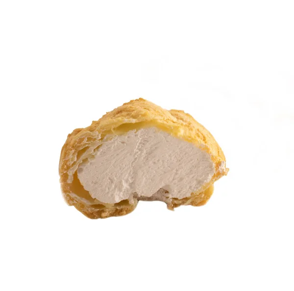 Close up view of choux with cream. Cut in half filled profiterole with vanilla cream .Traditional French dessert. — Stock Photo, Image