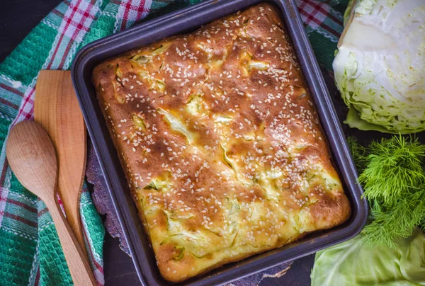 Baked pie of young cabbage — Stock Photo, Image