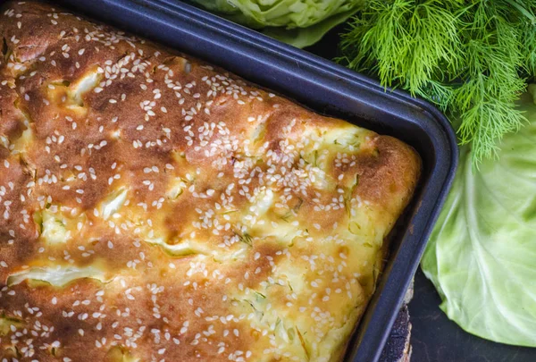 Baked pie of young cabbage — Stock Photo, Image