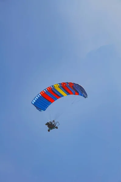 Summer trip on a paraglider with a motor.