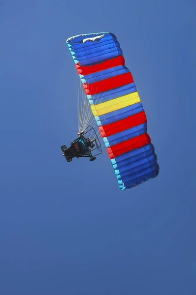 Summer trip on a paraglider with a motor.