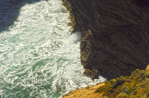 Rocks and waves of the Pacific ocean.