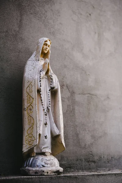 Close up of Statue of Our Lady of Grace virgin Mary . Лицензионные Стоковые Изображения