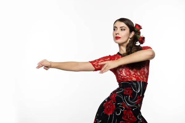 Ballerina di flamenco ragazza spagnola su uno sfondo chiaro. spazio libero per il testo — Foto Stock