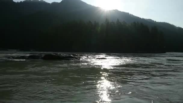 Landscape with mountains trees and a river at evening time — Stock Video