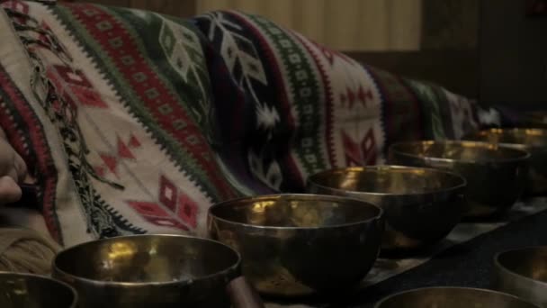 Meditation with Tibetan singing bowls. slow motion — Stock Video