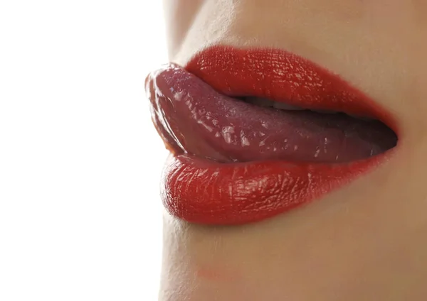 Extreme close up of sexy lip. Woman pursing her lips in a sexy seductive gesture — Stock Photo, Image