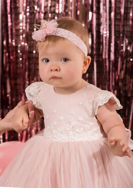 Beautiful fashionable little baby in pink dress. little princess poses like a doll — Stock Photo, Image