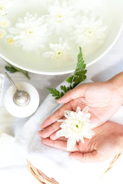 Spa beauty massage health wellness. Spa Thai therapy treatment aromatherapy for nail and hands woman with white flower nature candle for relax and summer time.  Lifestyle and cosmetic Concept
