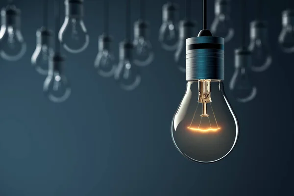 Hanging Glowing Light Bulb Blue Background — Stock Photo, Image