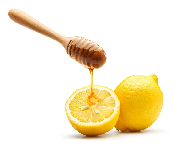 Miel Goteando Sobre Limón Fresco Aislado Sobre Fondo Blanco — Foto de Stock