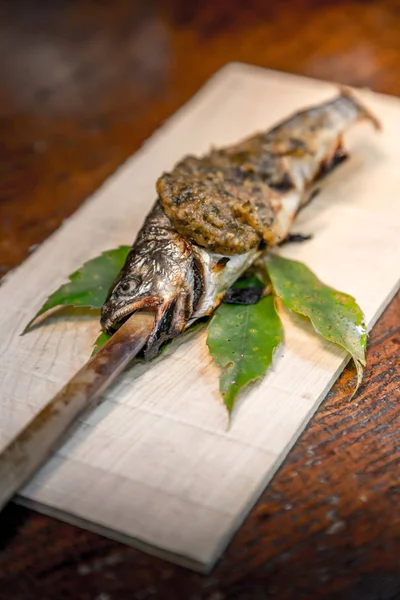 Fried Fish on stick in Autumn in Japan
