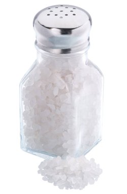 Beyaz background.vertical kompozisyonu izole cam tuz shaker