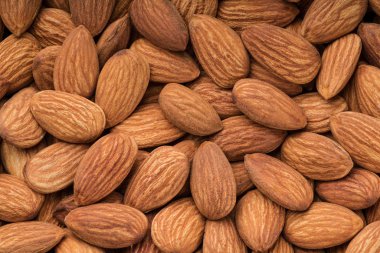 Soyulmuş badem arka plan olarak, atış makro yakın çekim