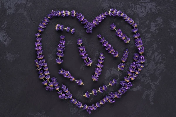 The pattern is a heart frame framed by lavender flowers.