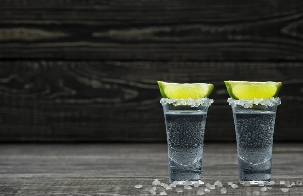 Two Shot Cold Silver Tequila White Salt Crystals Lime Black — Stock Photo, Image