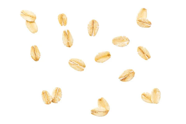 Beyaz arka plan üzerinde izole kuru çiğ yulaf gevreği. Düz taneleri buğday, kepek, arpa, güle güle hububat müsli veya granola haddelenmiş